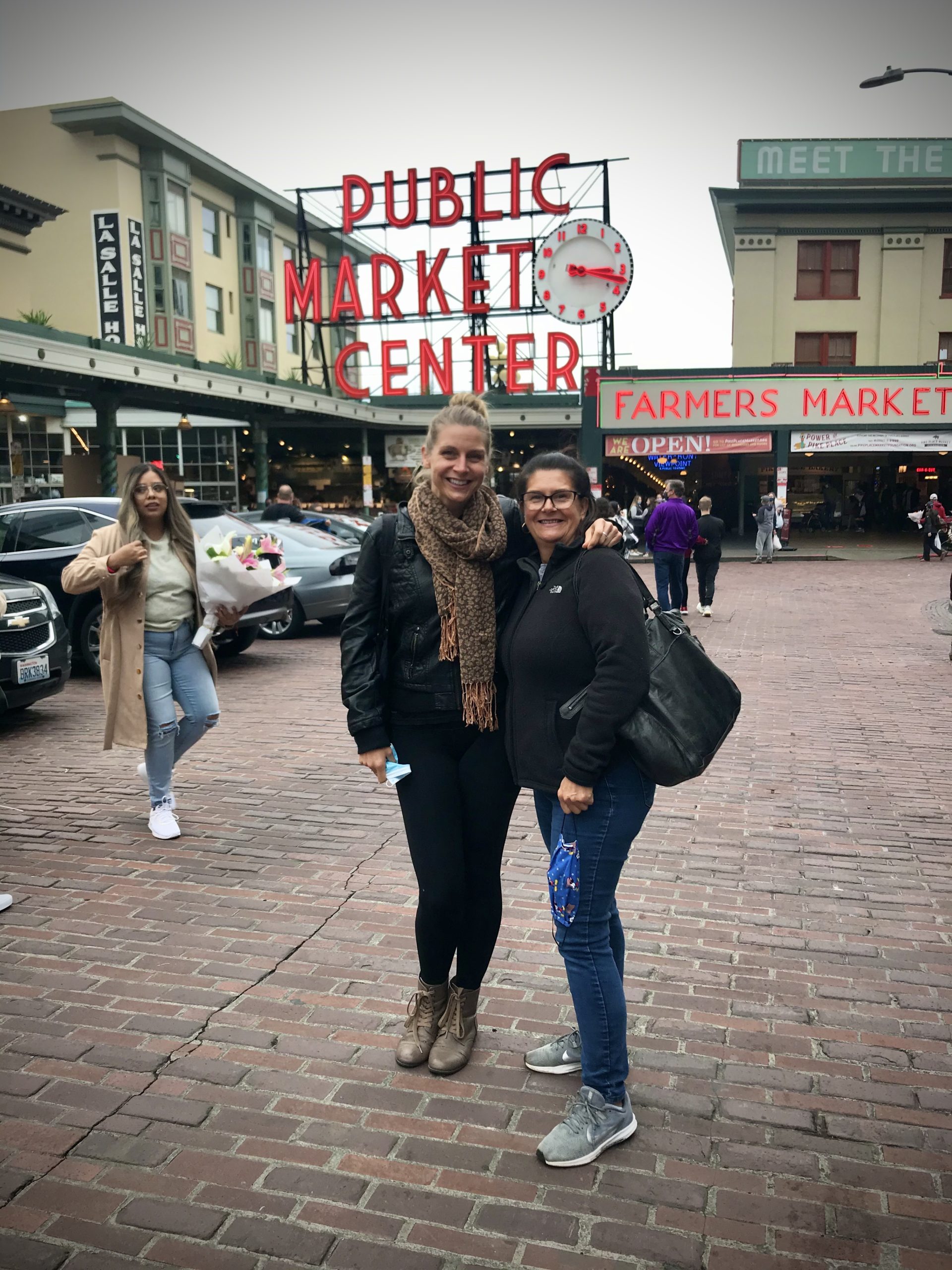 seattle, things to do in seattle,Pike Place Market, posing in front of public market, trip to Seattle